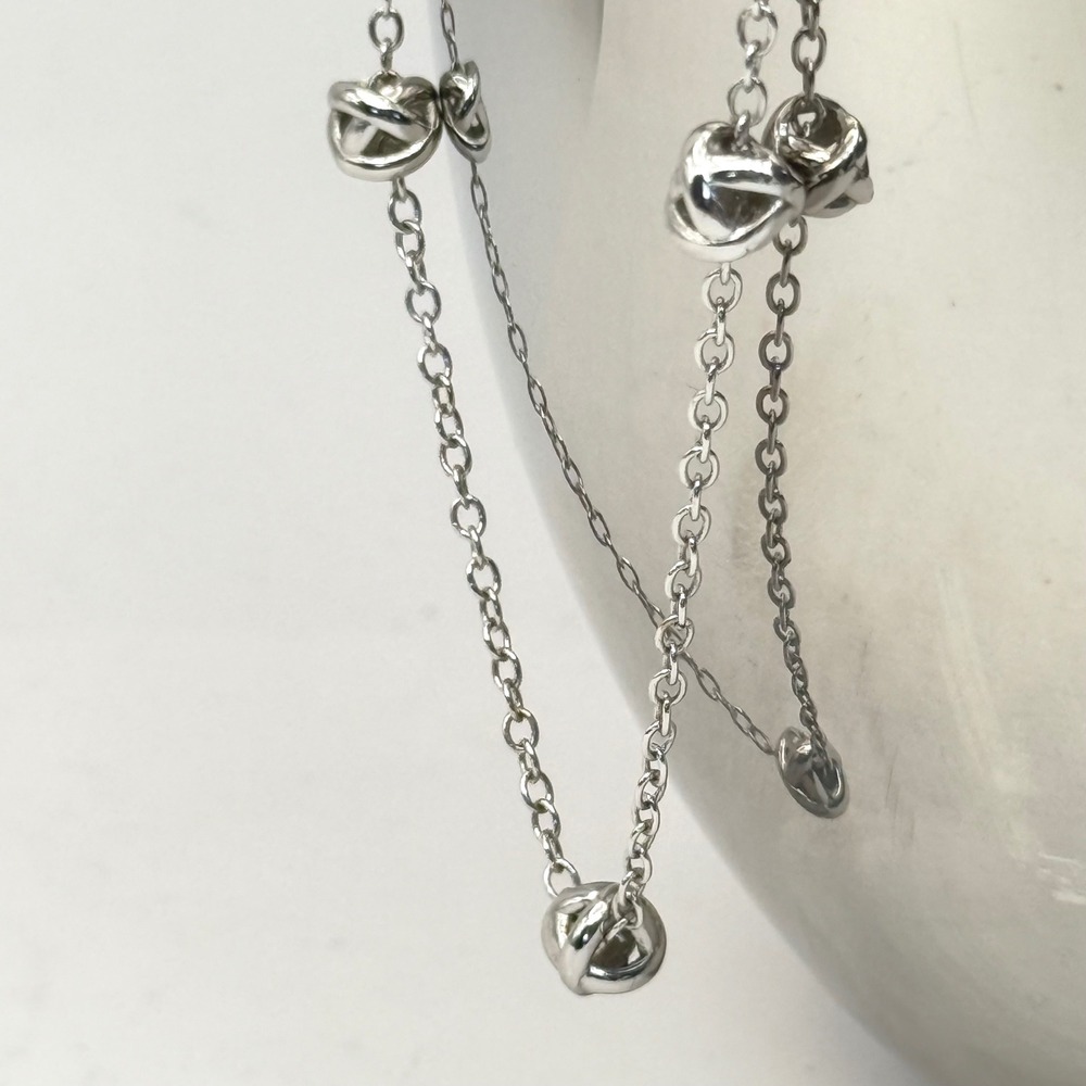 Hollywood Sensation Silver Tone Necklace with Three‎ Knot Beads, Adjustable